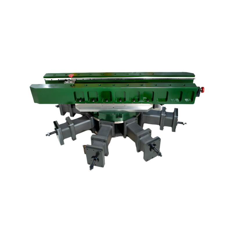 A large green industrial machine with a rectangular upper section and multiple grey arms extending outward, each ending in a clamp or fixture, set against a plain white background.