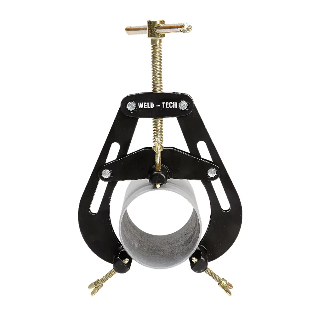 A black and gold metal PF CLAMP holds a cylindrical pipe horizontally. The clamp has threaded screws and wing nuts for adjustment.